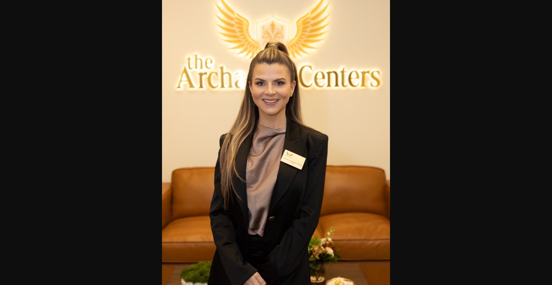 After: Lauren's real portrait at Archangel Centers sign